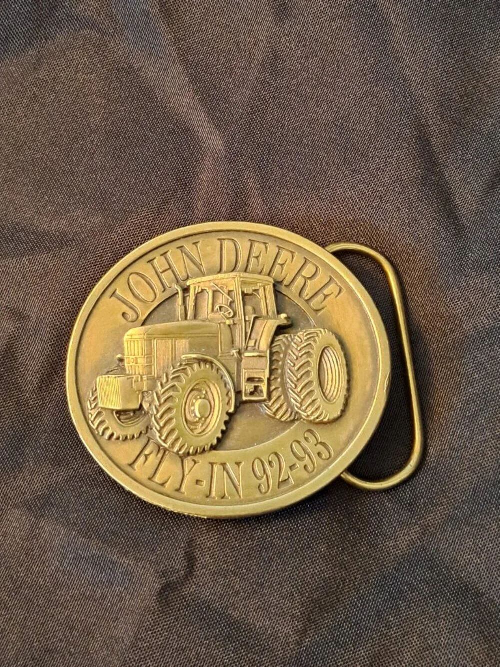 Vintage Bergamot Brass Works John Deere belt buckle with a 1992-93 Fly-In design